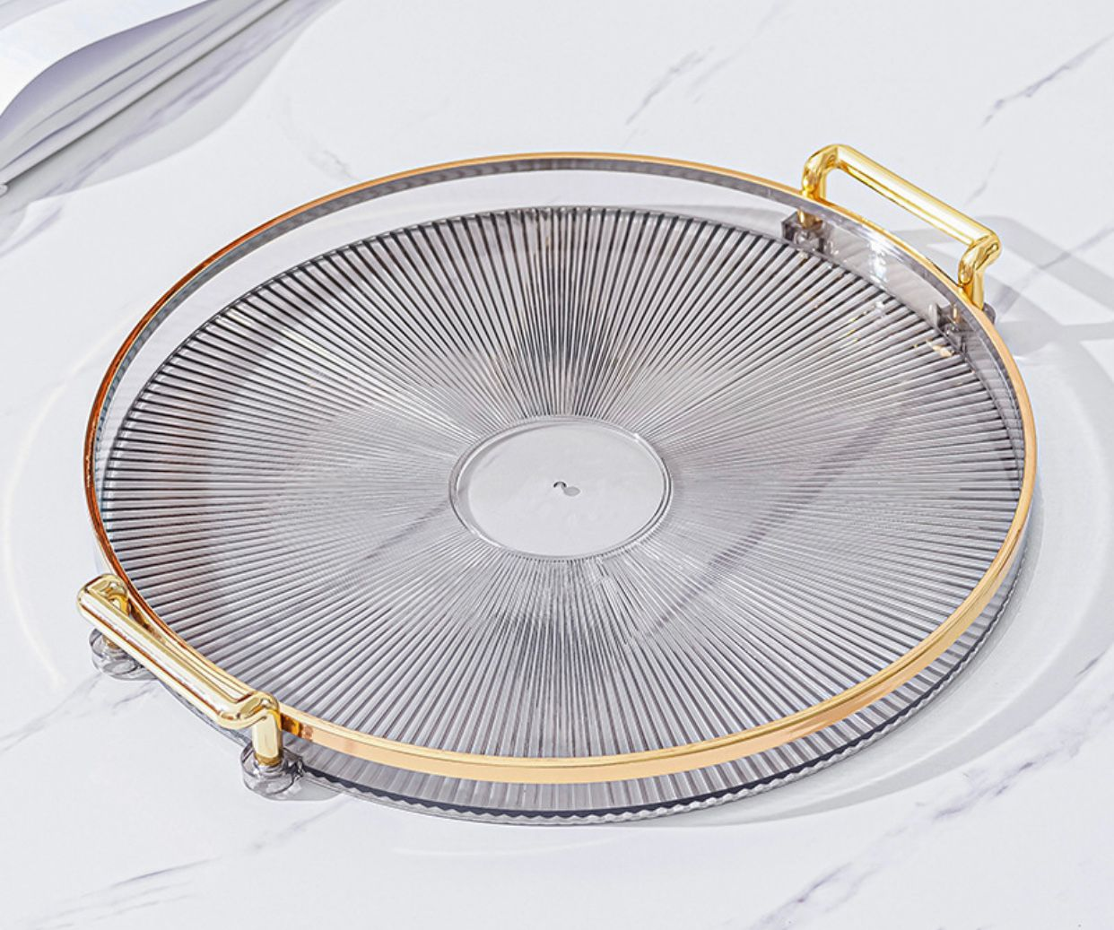 Round Serving Tray with Golden Handles and Candle Centerpiece
